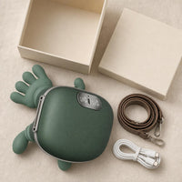 What's in the box: ComfyHug massager, leather shoulder strap and USB-C cable